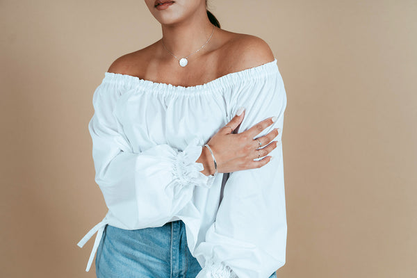 Our Model wearing the silver full moon neckalce
