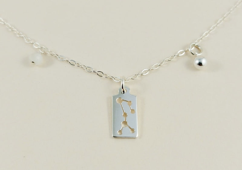 the silver sagittarius necklace