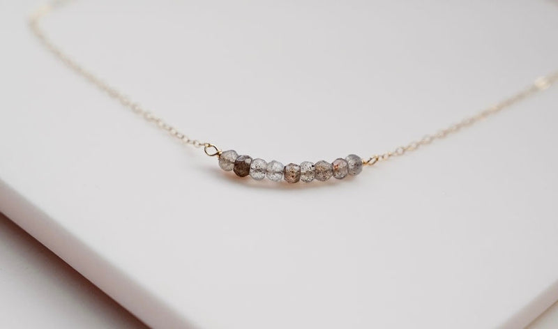 The gold strand gem necklace with labradorite